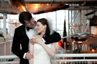 Bride and groom posing for wedding photos at VASC