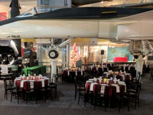Tables and chairs set up for a holiday banquet dinner